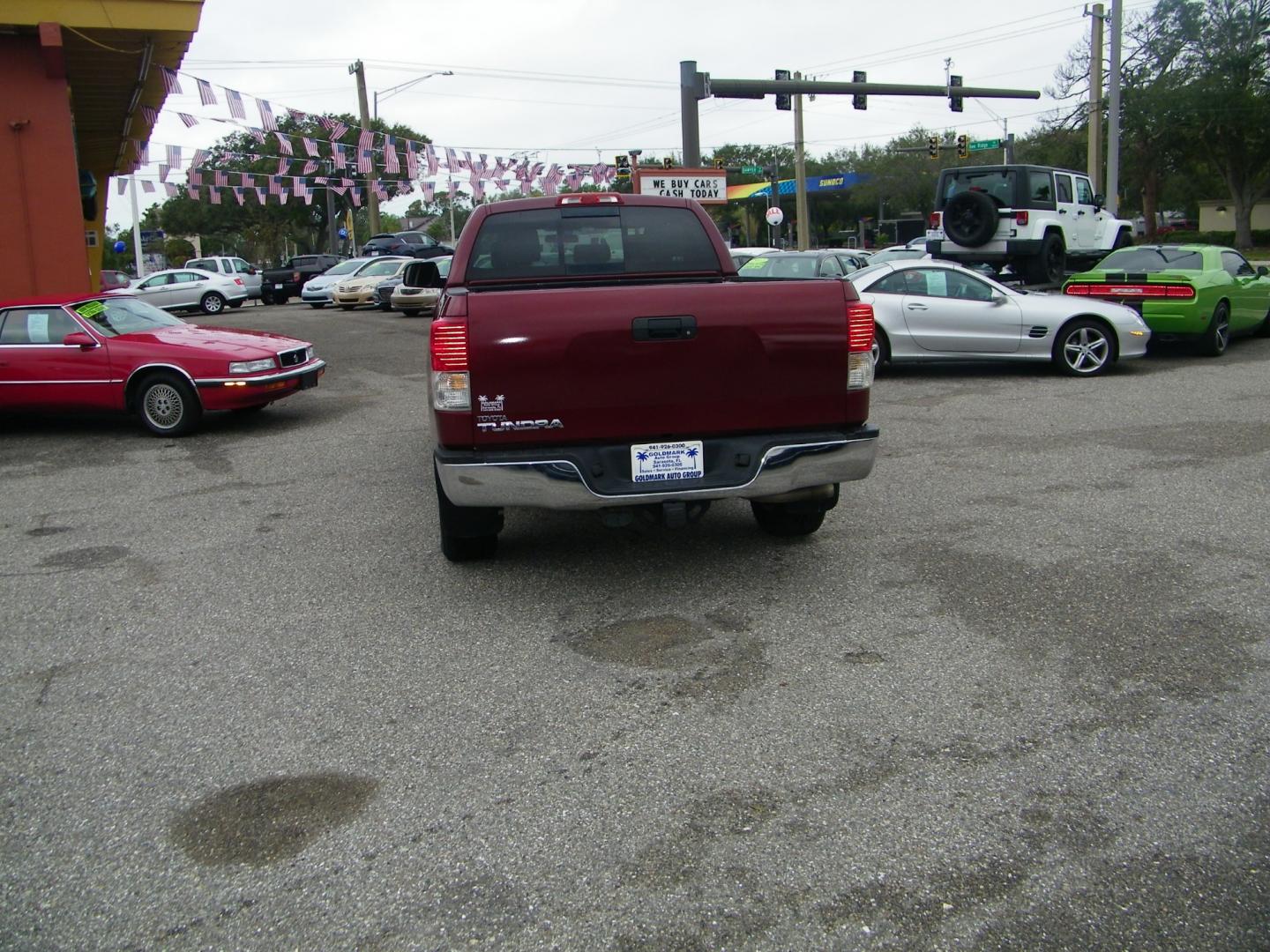 2010 Maroon /Gray Toyota Tundra SR5 Double Cab 4.6L 2WD (5TFRM5F14AX) with an 4.6L V8 DOHC 32V engine, 5-Speed Automatic Overdrive transmission, located at 4000 Bee Ridge Road, Sarasota, FL, 34233, (941) 926-0300, 27.298664, -82.489151 - Photo#4